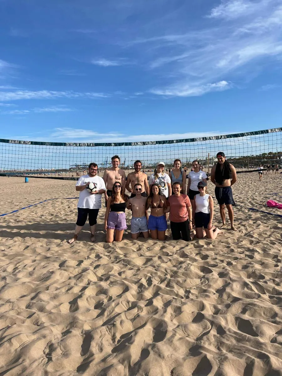 AIP students playing beach volleyball