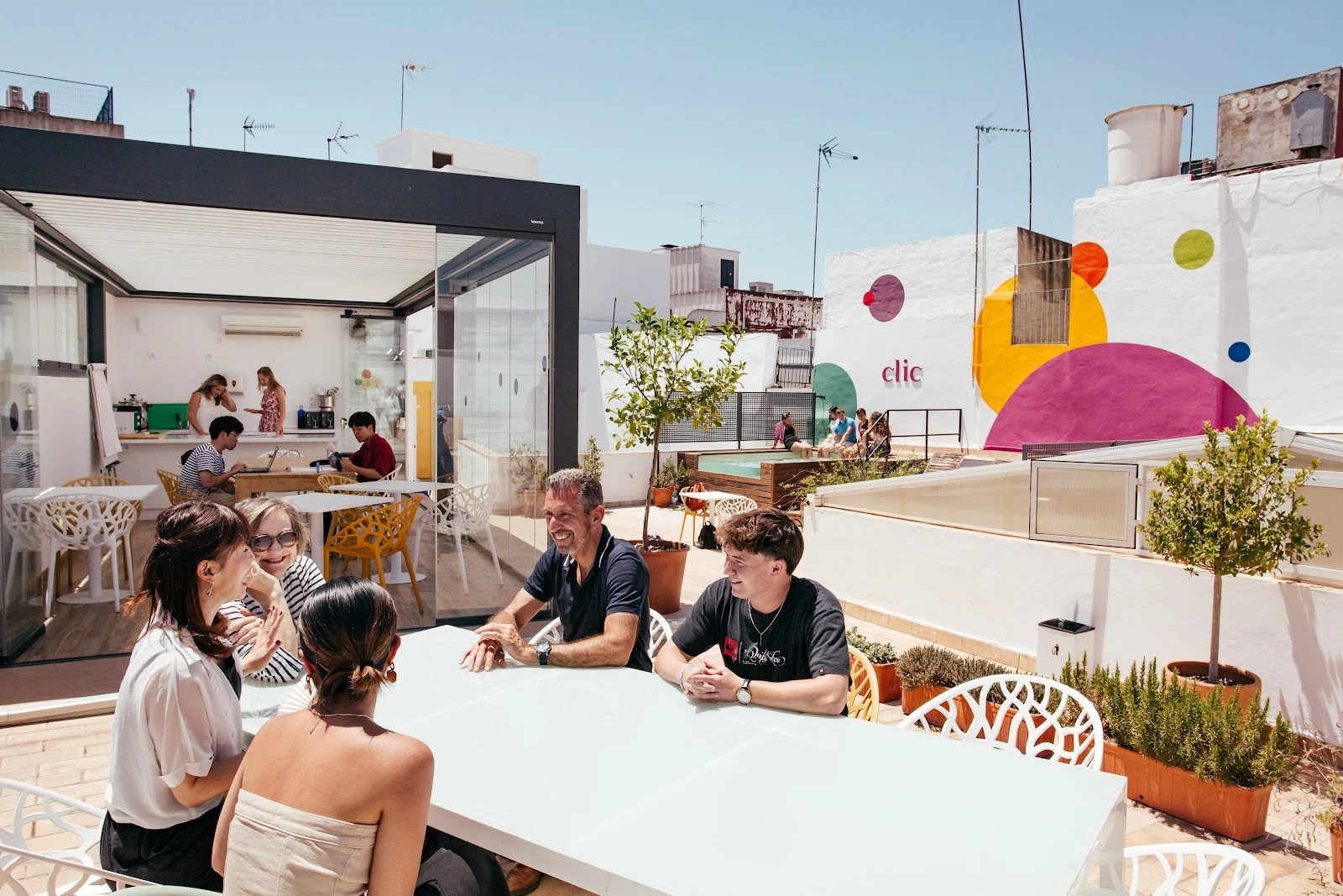 Rooftop terrace and shared student space at CLIC Seville