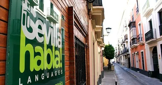Street view and entrance of Sevilla Habla